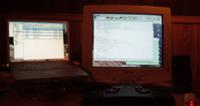 Powerbook on iCurve next to big monitor